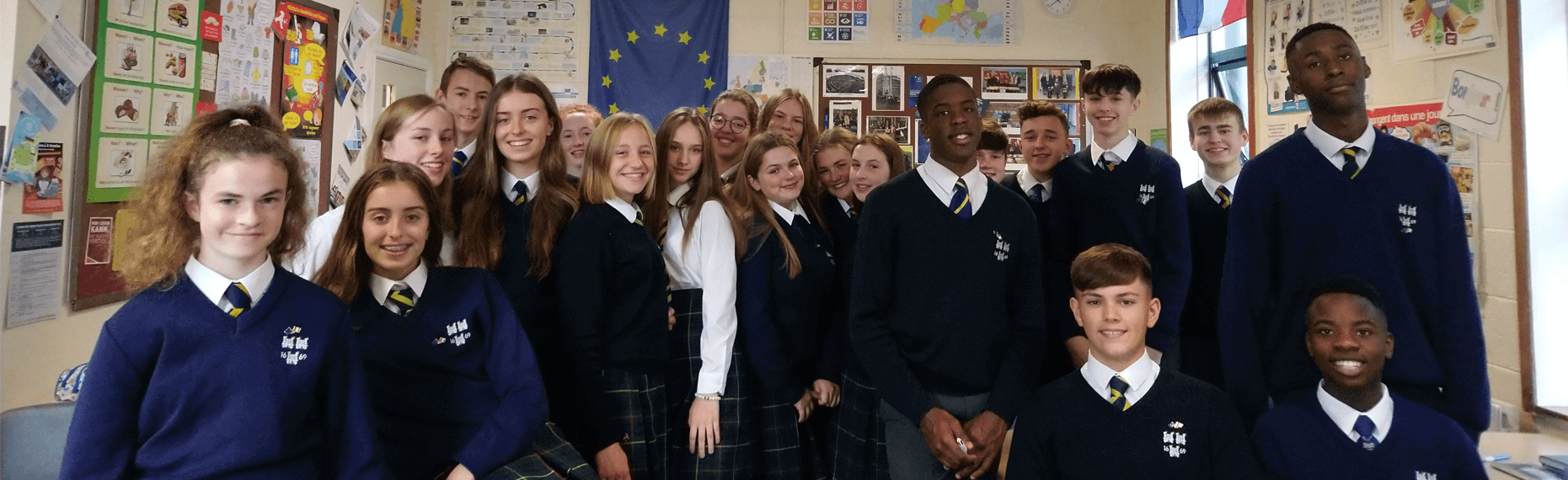 A group of students involved in eTwinning pictured in a classroom