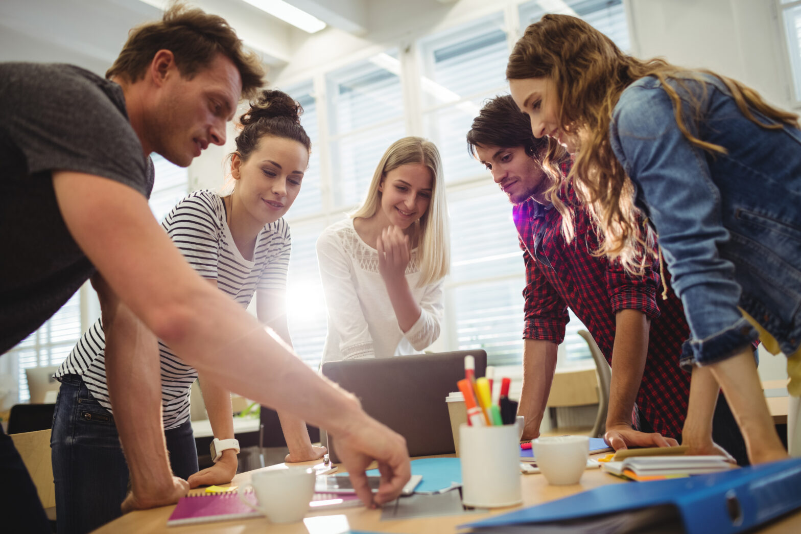 A stock image of young people working on a project
